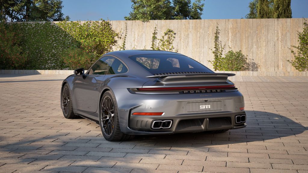 Rear view of the 2026 Porsche 911 Turbo S for sale with LED taillights, active rear spoiler, and dual exhaust outlets.