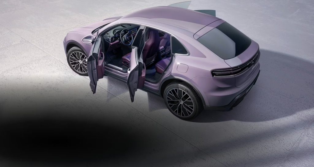 2026 Porsche Macan EV driving in city traffic showing benefits for gas SUV drivers
