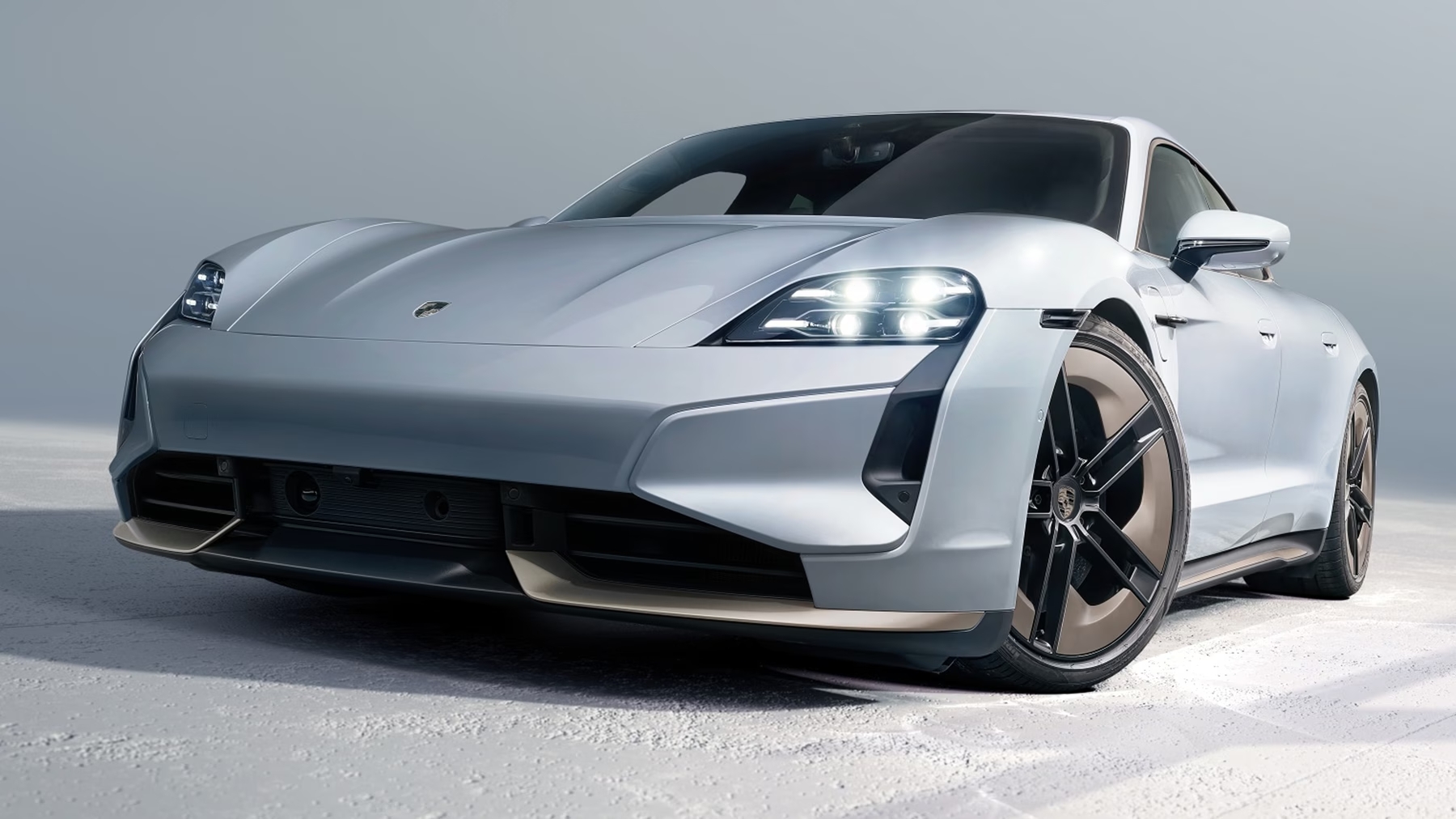 Silver Porsche electric car highlighting the electric future for drivers in Chicago.