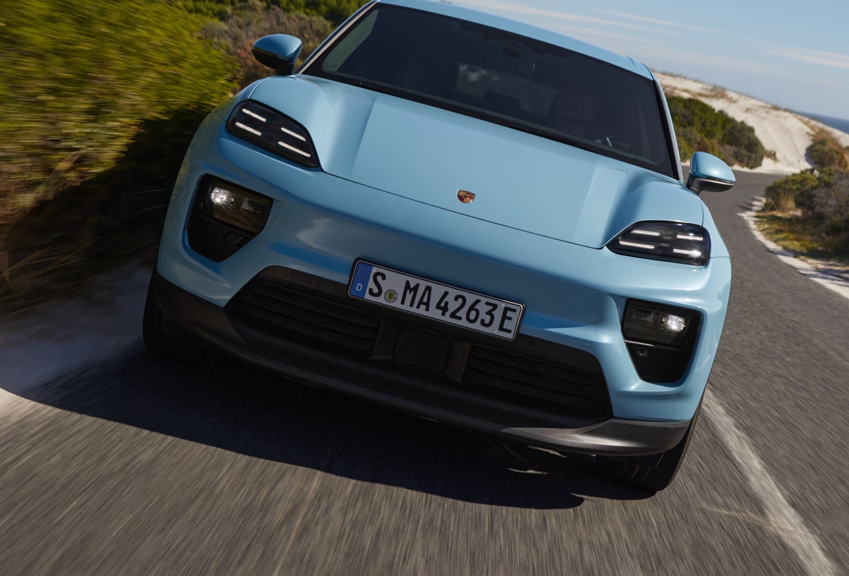 Porsche Macan gas vs EV performance SUV comparison for 2026 driving needs