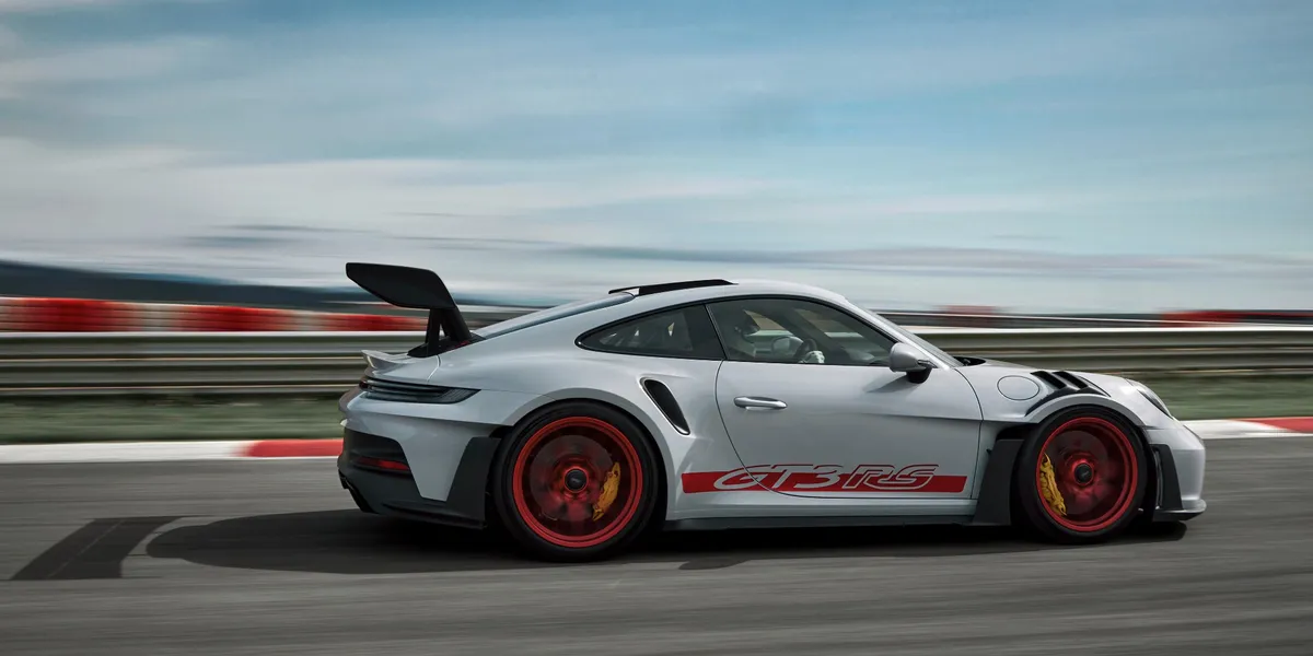 2026 Porsche 911 Carrera front driving view through high-speed urban tunnel