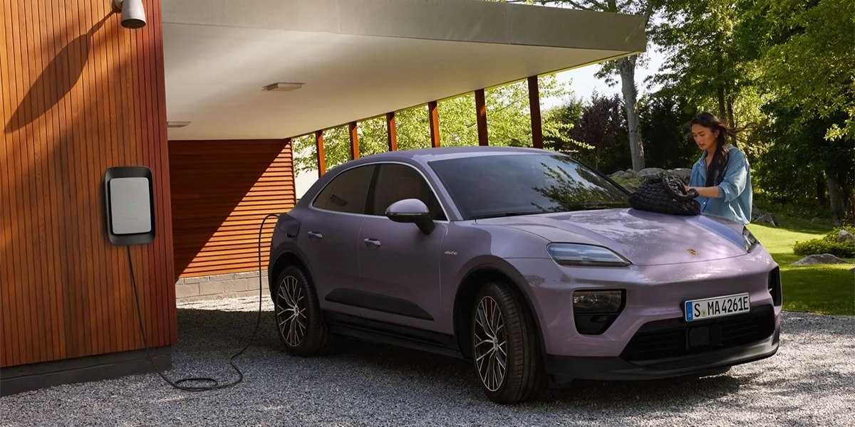 2026 Porsche Macan Electric 4 charging at home wallbox station in Lincolnwood, IL