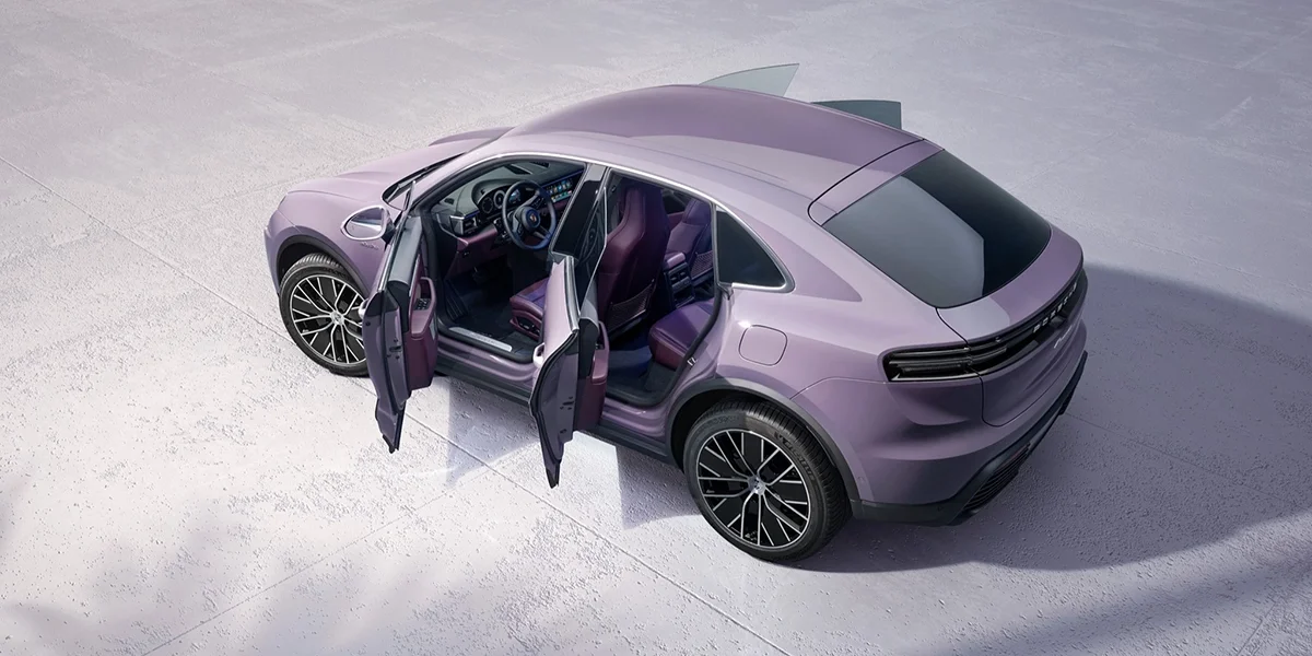 2026 Porsche Macan Electric 4 with all doors open showcasing interior design