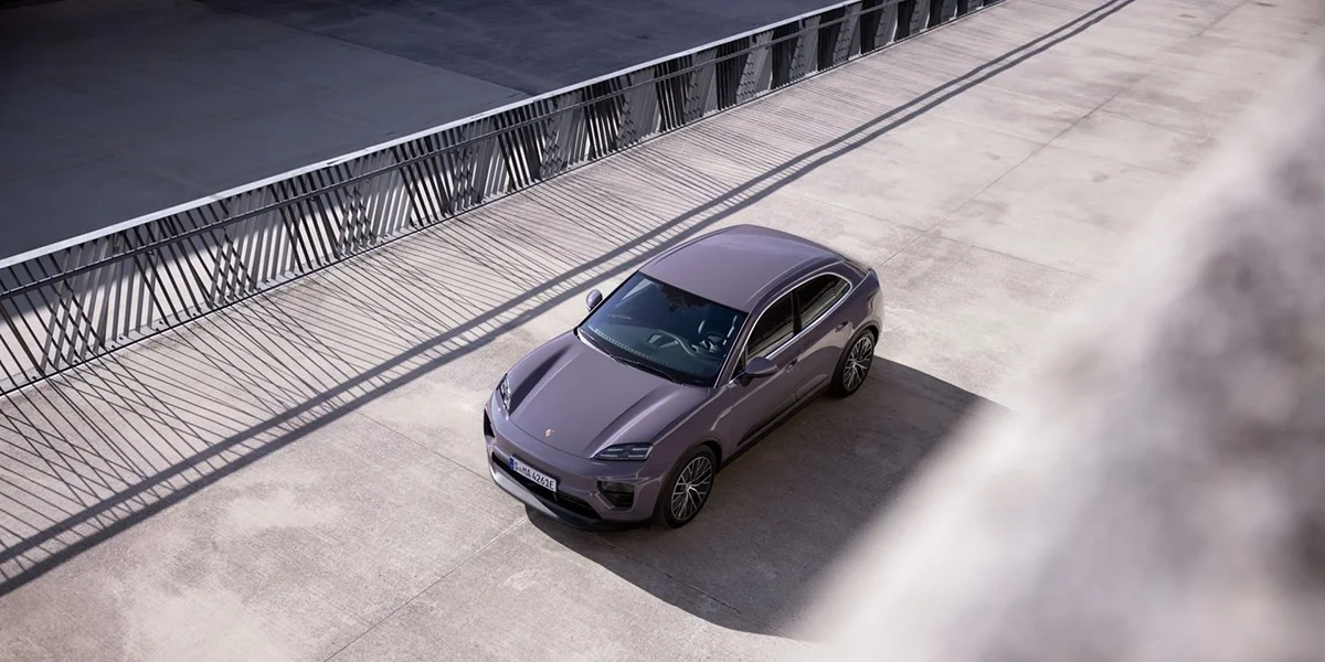 Top view of 2025 Porsche Macan Electric in violet metallic exterior