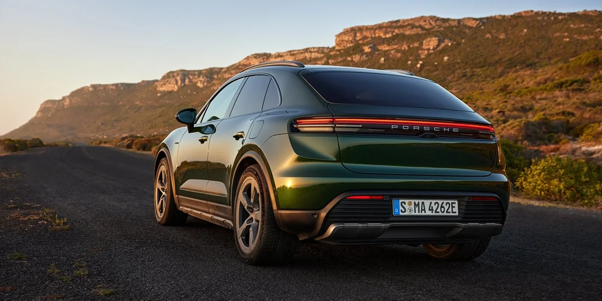 2026 Porsche Macan Electric 4S with all doors open showcasing interior design