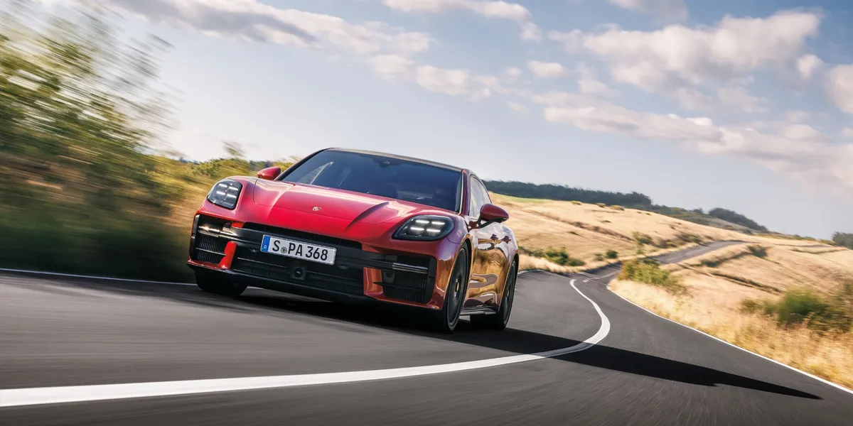 2026 Porsche Panamera GTS driving through winding country roads