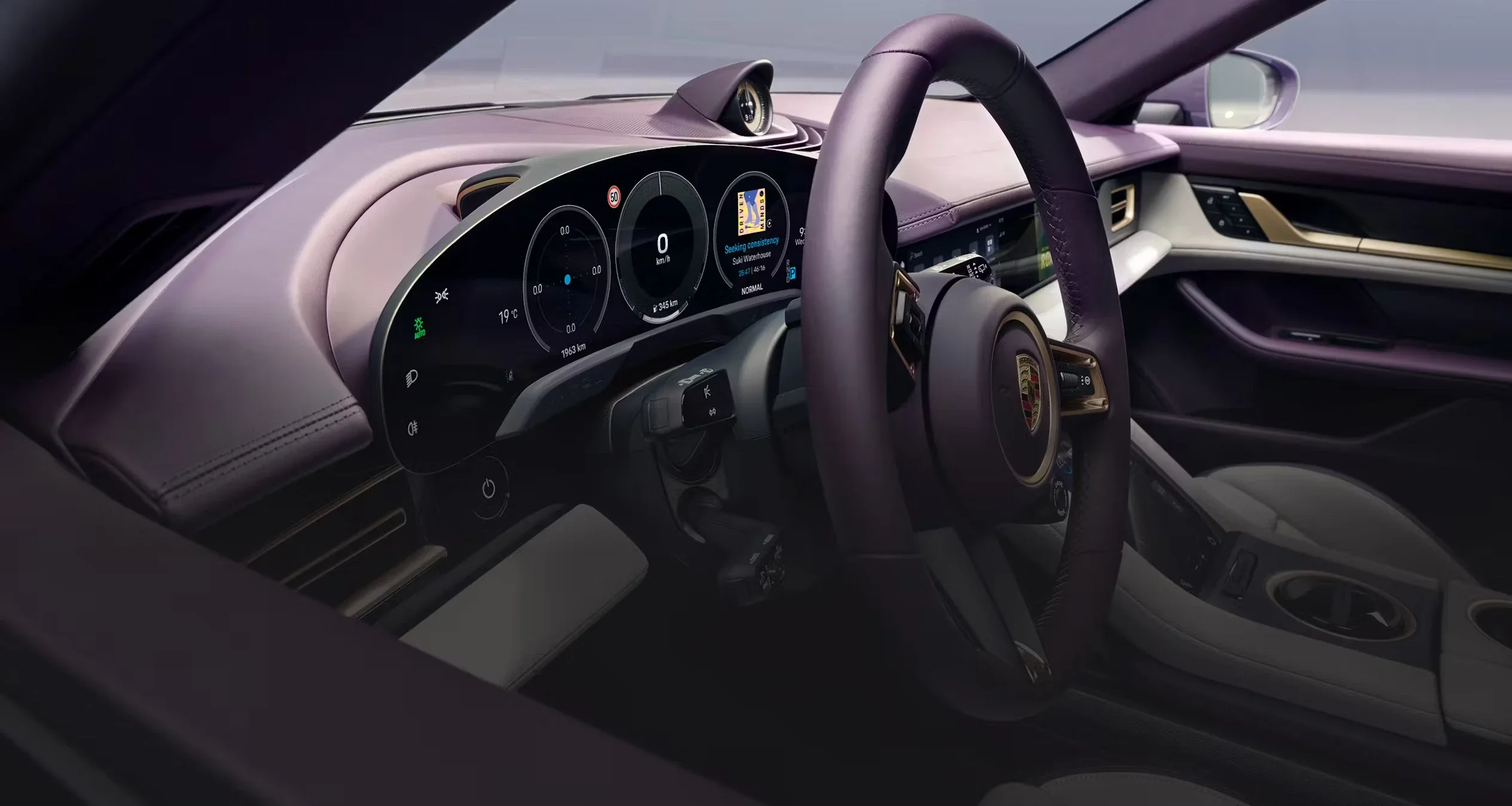 Close-up of Porsche Taycan Cross Turismo 21-inch alloy wheel with black and silver finish and Porsche crest.