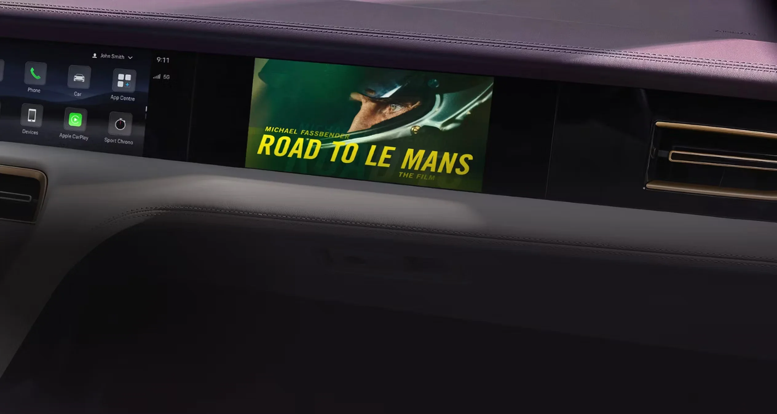 Front angle of Porsche Taycan Cross Turismo in Frozen Berry Metallic highlighting aerodynamic electric design and four-door versatility.