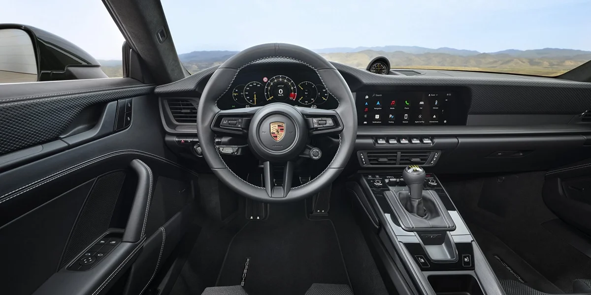 Close-up of Porsche 911 GT3 bronze alloy wheel and brake system with GT3 badging.