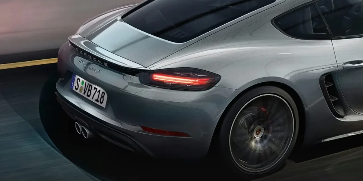 Porsche 718 Cayman exterior highlighting its compact aerodynamic design, sculpted curves, and performance-inspired shape.
