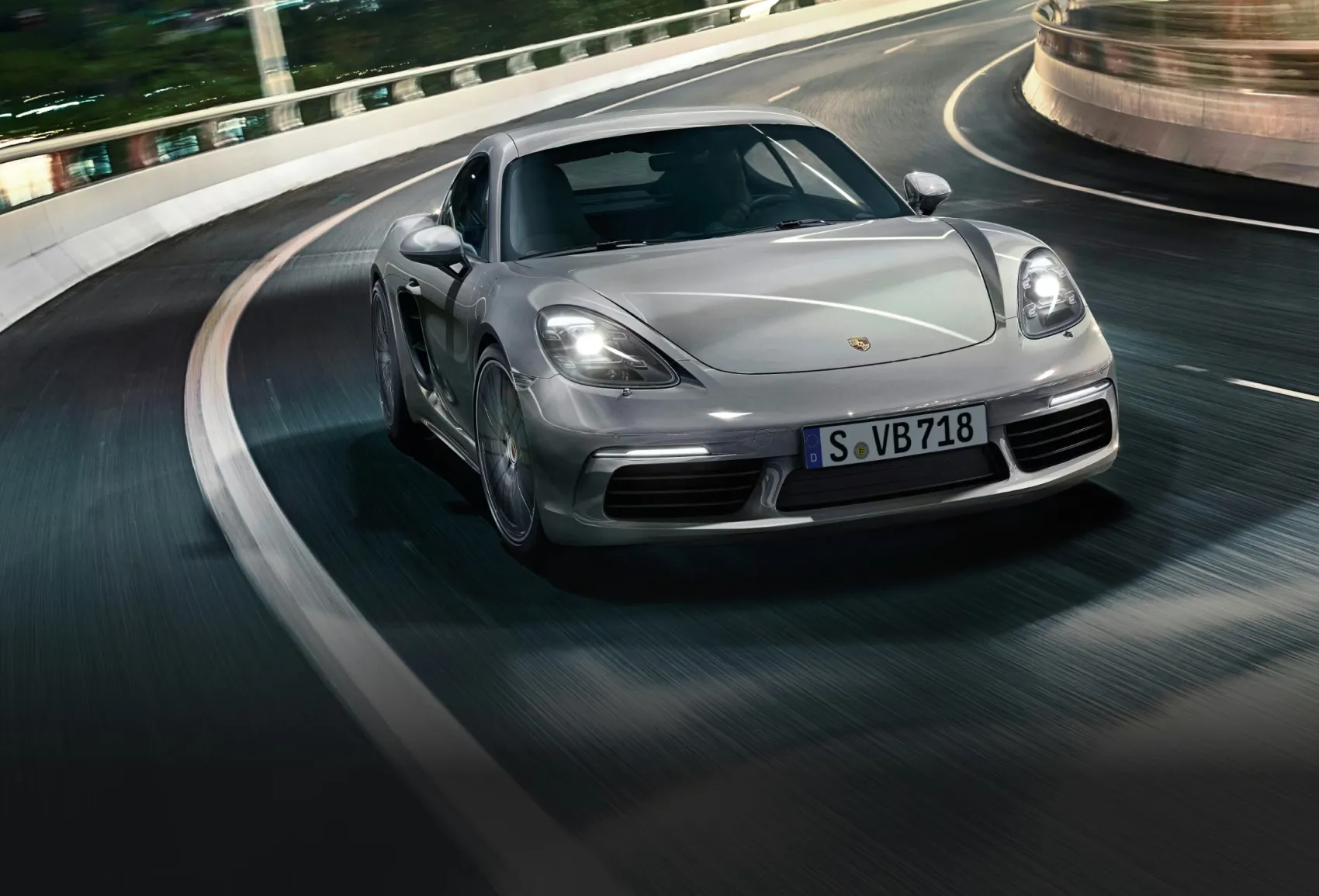 Porsche 718 Cayman illustrating its mid-engine performance architecture for improved weight distribution and responsive cornering.