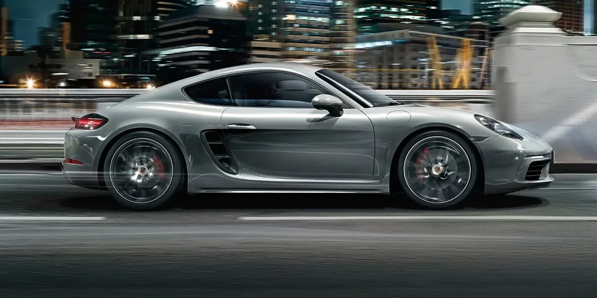  Interior or mechanical view related to Porsche 718 Cayman transmission options, emphasizing manual and automatic performance features.