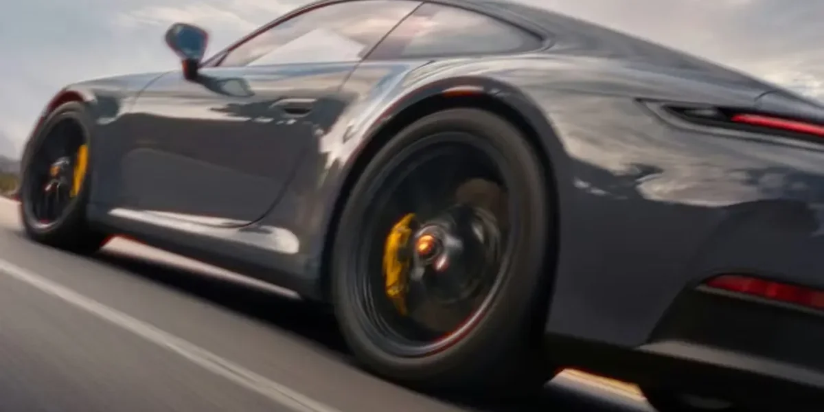 Porsche 911 twin-turbocharged flat-six engine detail emphasizing performance engineering.