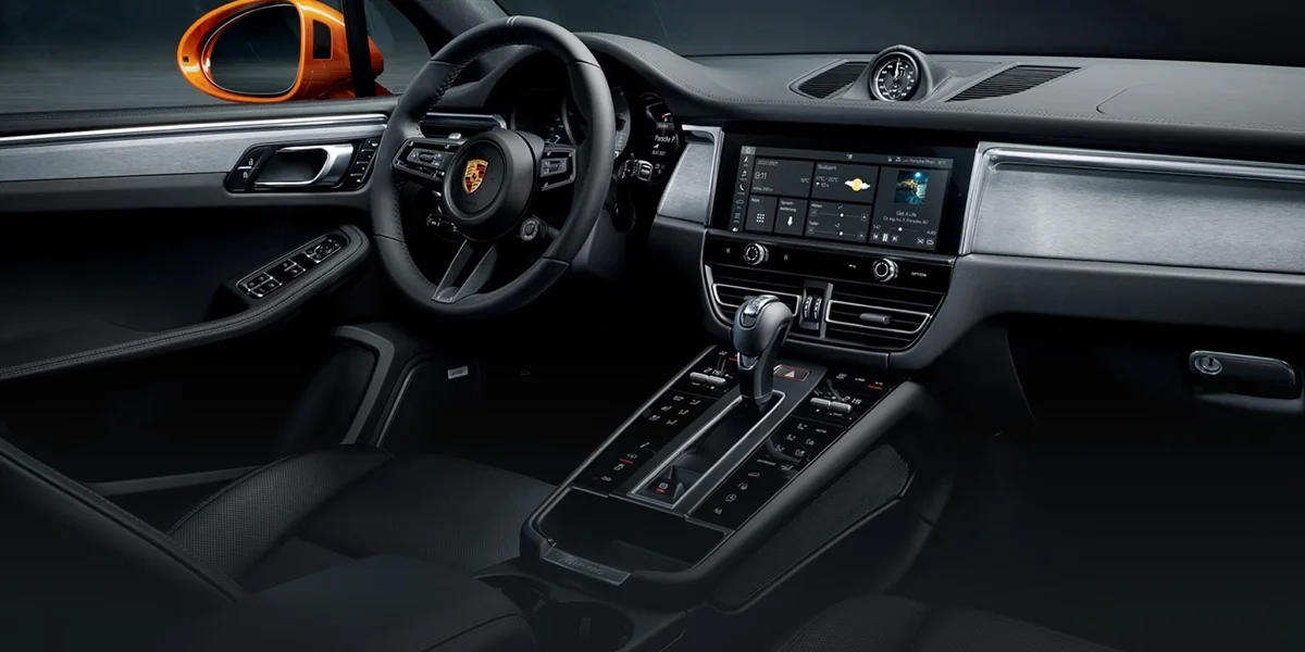 Porsche Macan featuring Porsche Active Suspension Management (PASM), improving ride comfort, control, and cornering stability.