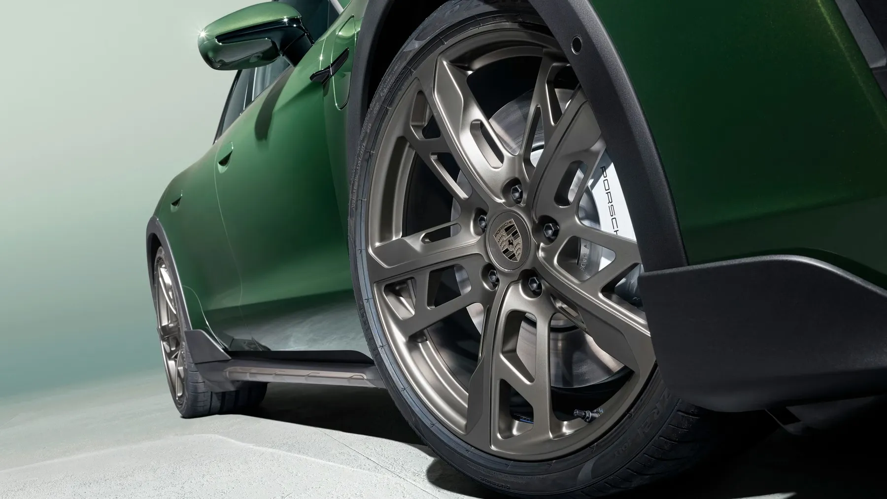 Porsche Taycan Cross Turismo increased ride height with Gravel mode driving feature