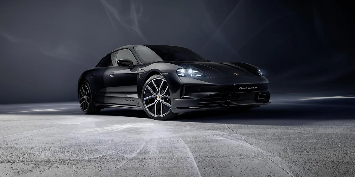 Porsche Taycan wheel and fender detail in Frozen Blue