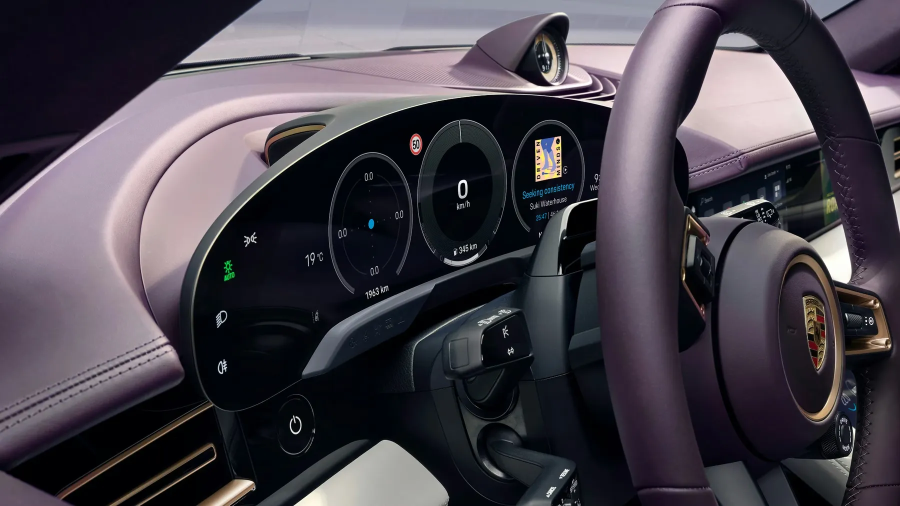 Porsche Taycan Sport Turismo interior featuring digital performance display and modern dashboard.