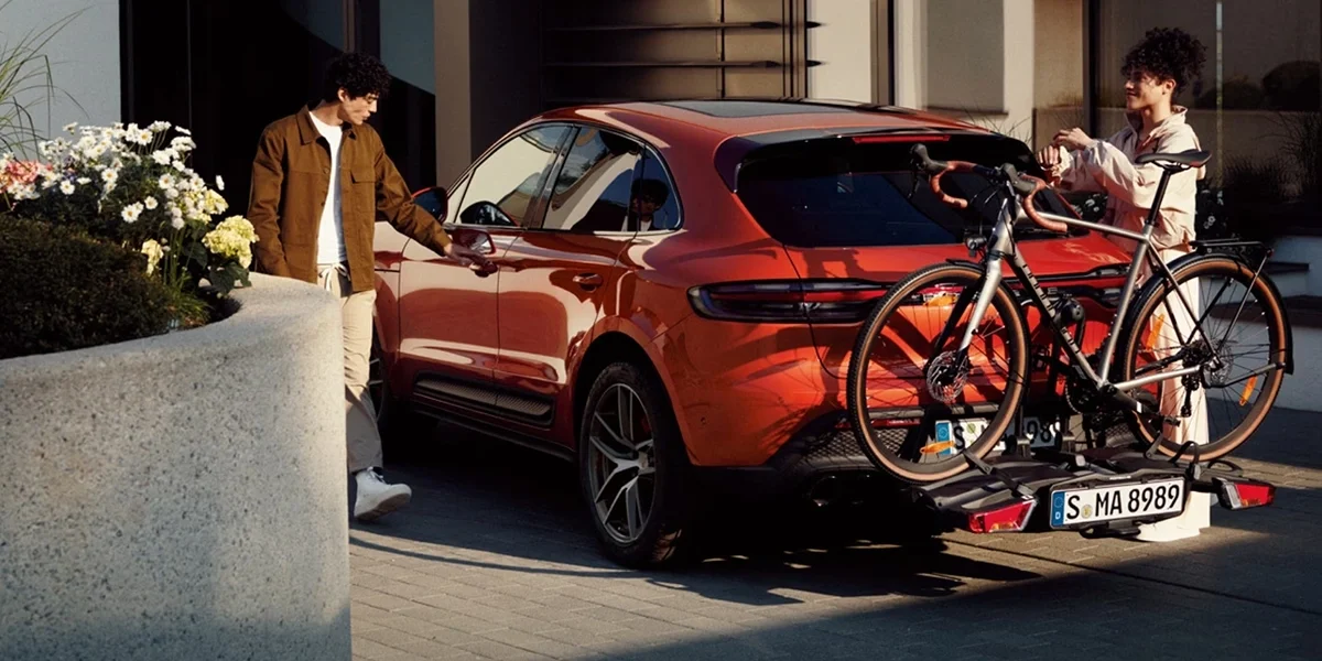 Side profile of the Porsche Macan showing compact performance proportions, sculpted body lines, and sporty stance